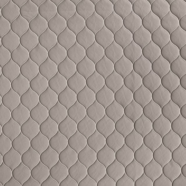 Warm taupe woven fabric with small repeating scalloped outline pattern