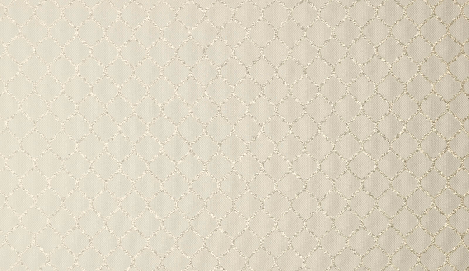 Soft ivory woven fabric with a small geometric all-over texture