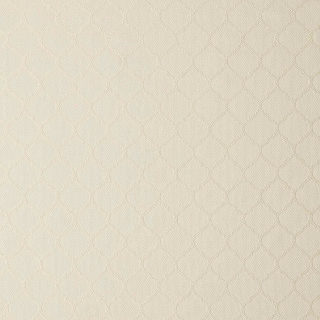 Soft ivory woven fabric with a small geometric all-over texture