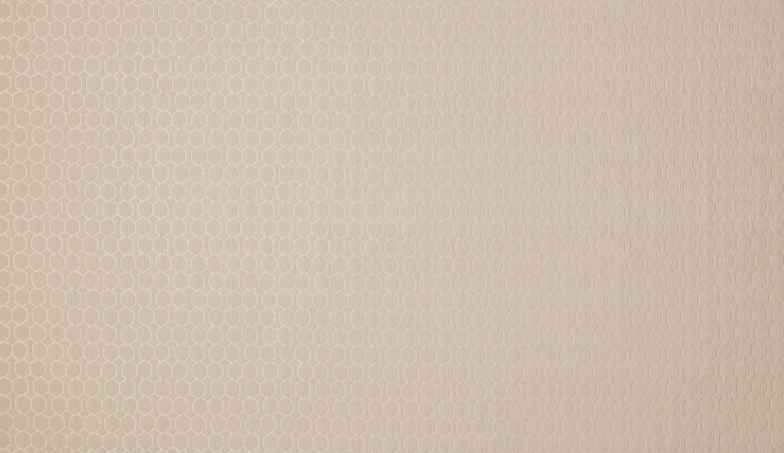 Pale champagne cream woven fabric with a small hexagonal geometric texture