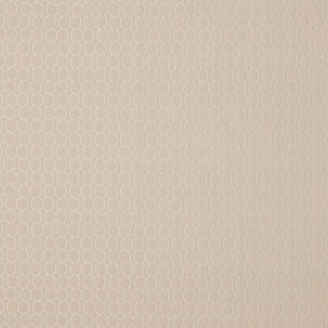 Pale champagne cream woven fabric with a small hexagonal geometric texture