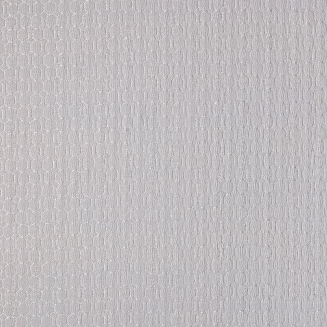 Close-up of pale oyster ivory woven fabric with a fine textured small-scale pattern