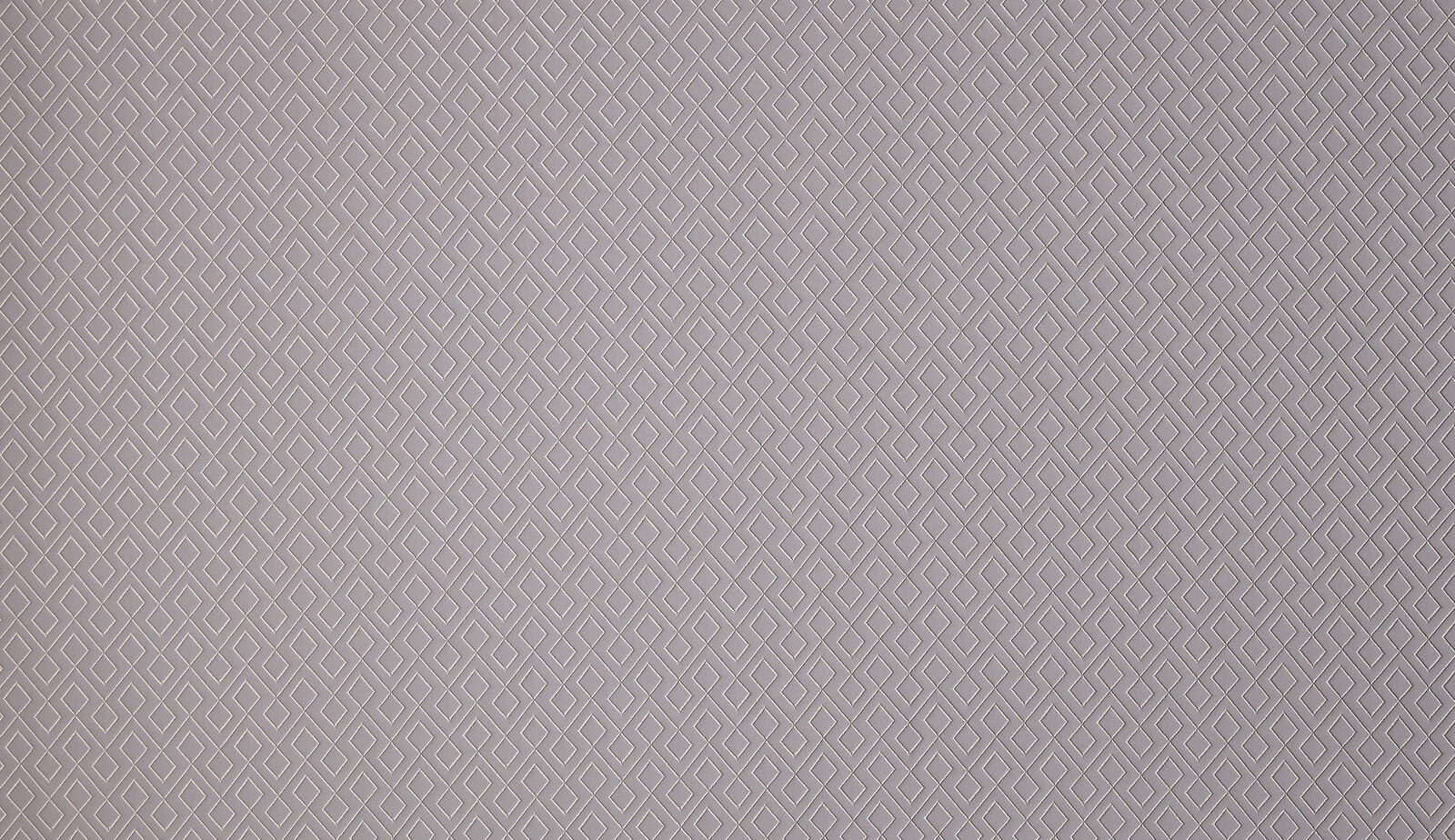 Close-up of pale graphite grey geometric weave with small diamond pattern
