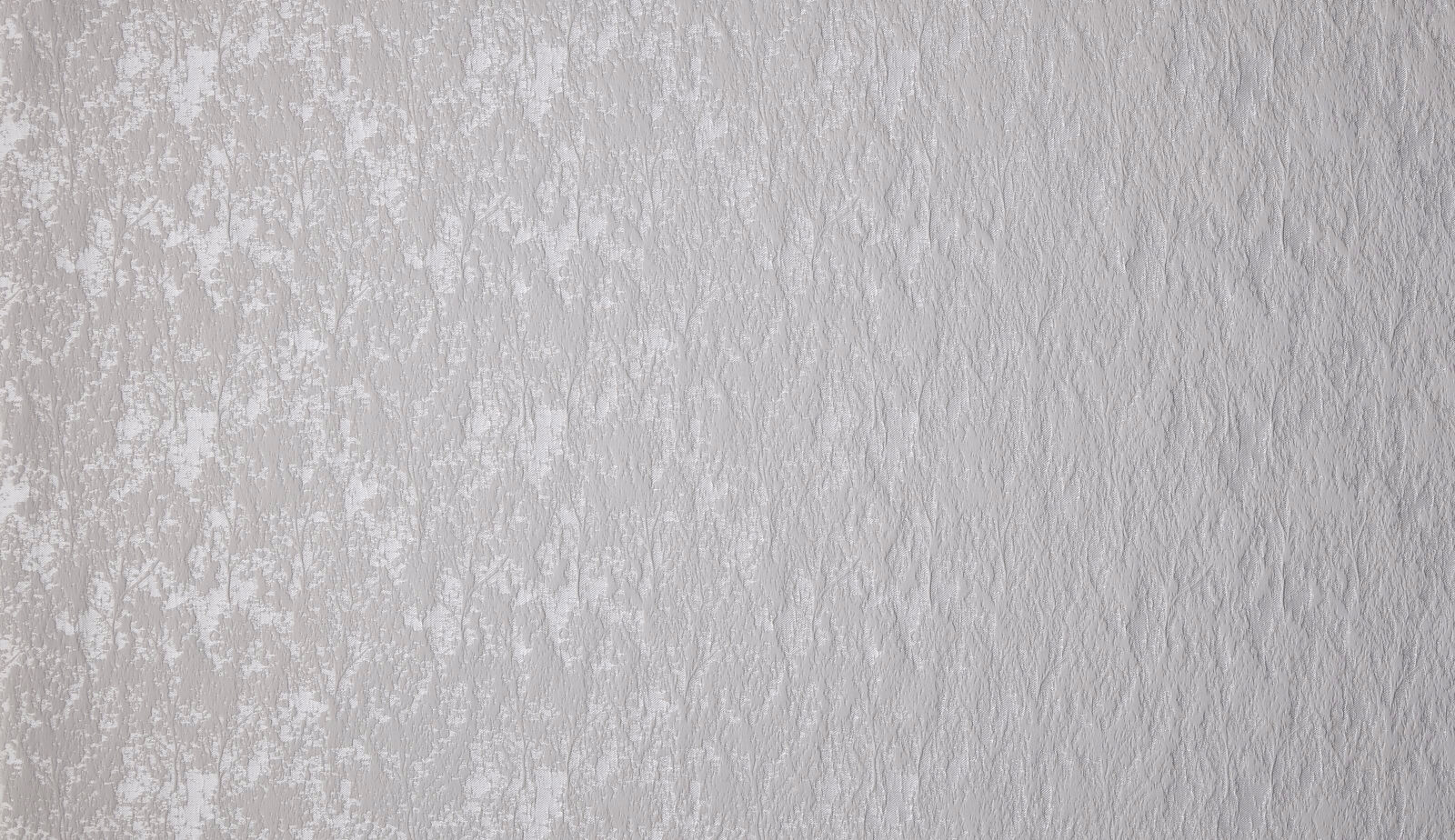 Pale platinum grey textured floral drapery fabric with soft tonal weave