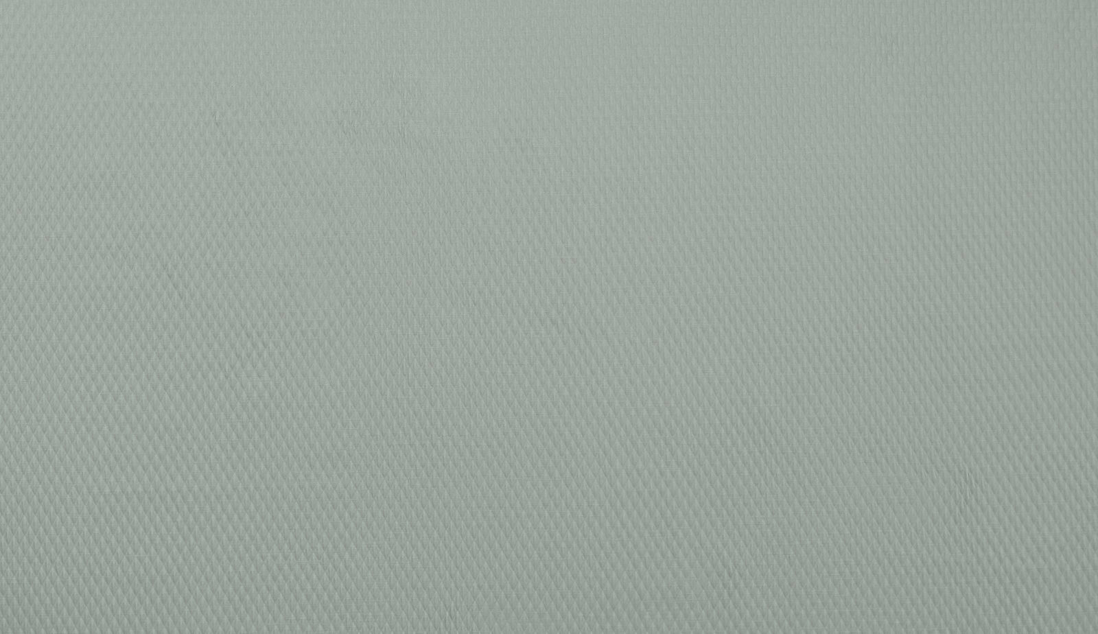 Pale sage green woven fabric with a fine diagonal texture
