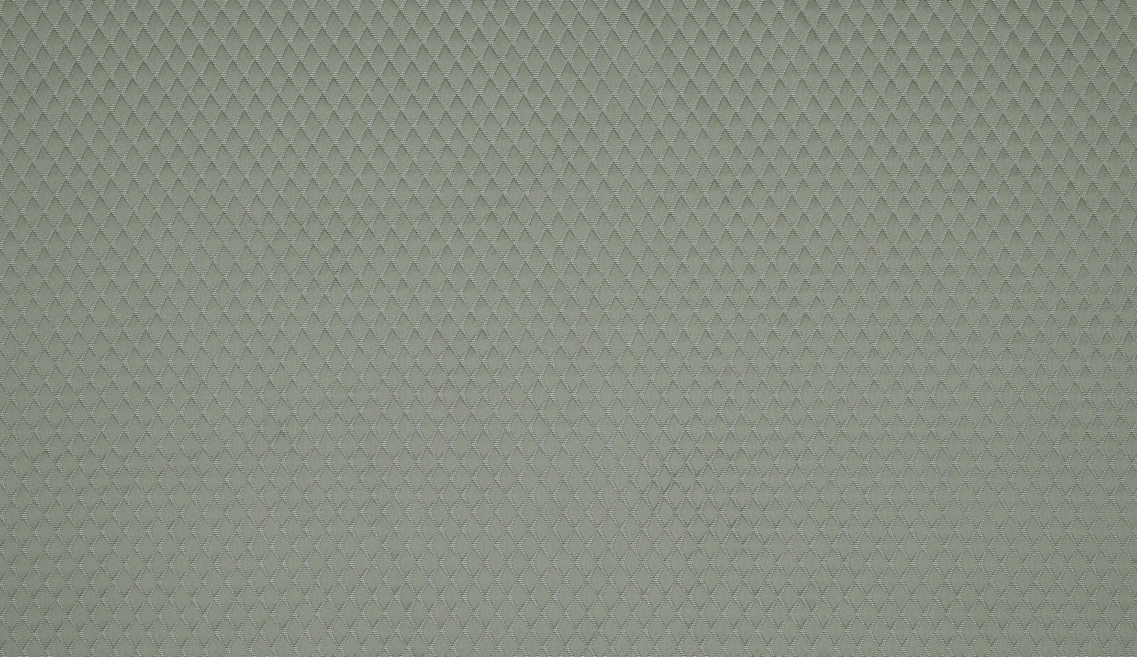 Soft sage green woven fabric with small diamond geometric texture