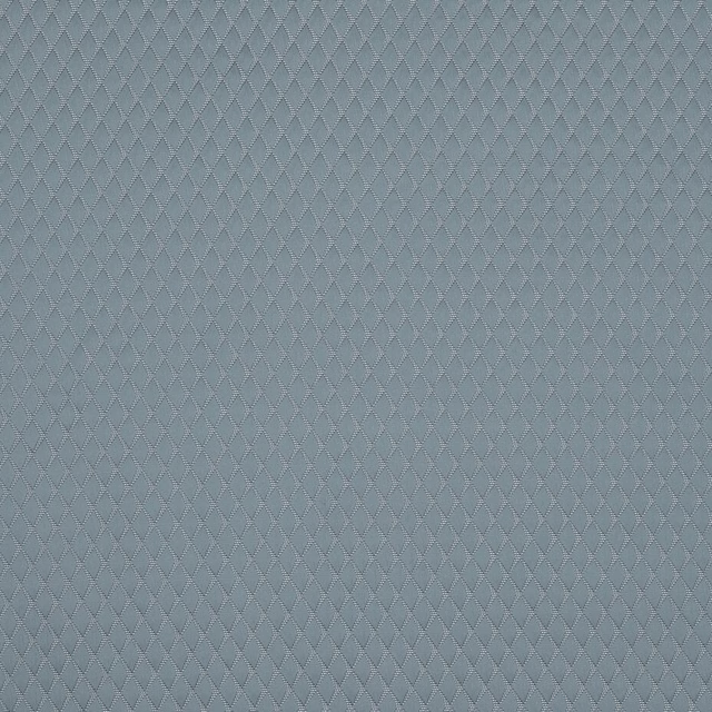 Soft dusty sky-blue geometric woven fabric with tiny diamond texture