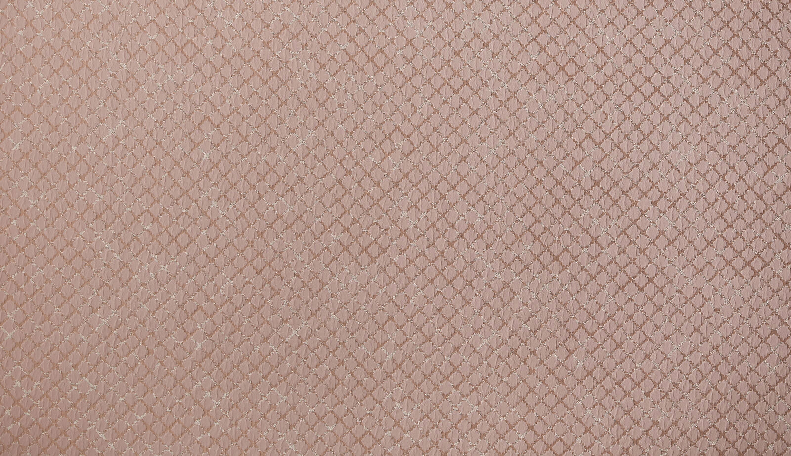 Soft blush pink woven fabric with small geometric lattice texture