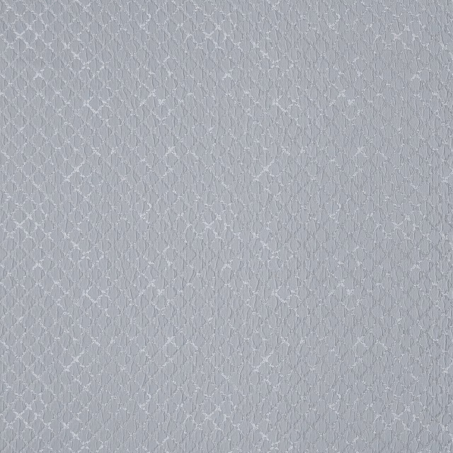 Pale ice blue small-scale geometric woven fabric with a subtle textured surface