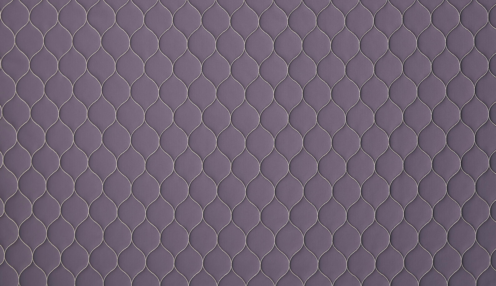 Muted amethyst woven fabric with a small repeating lattice pattern