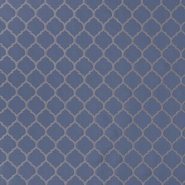 Muted denim blue woven fabric with small linked geometric pattern