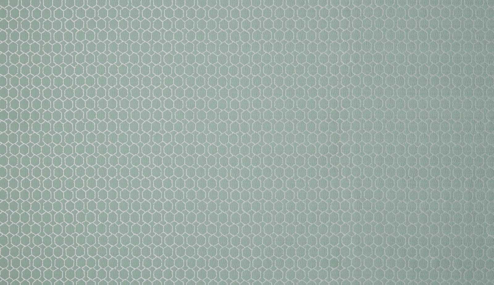 Soft sage green geometric weave fabric with a fine small-scale pattern