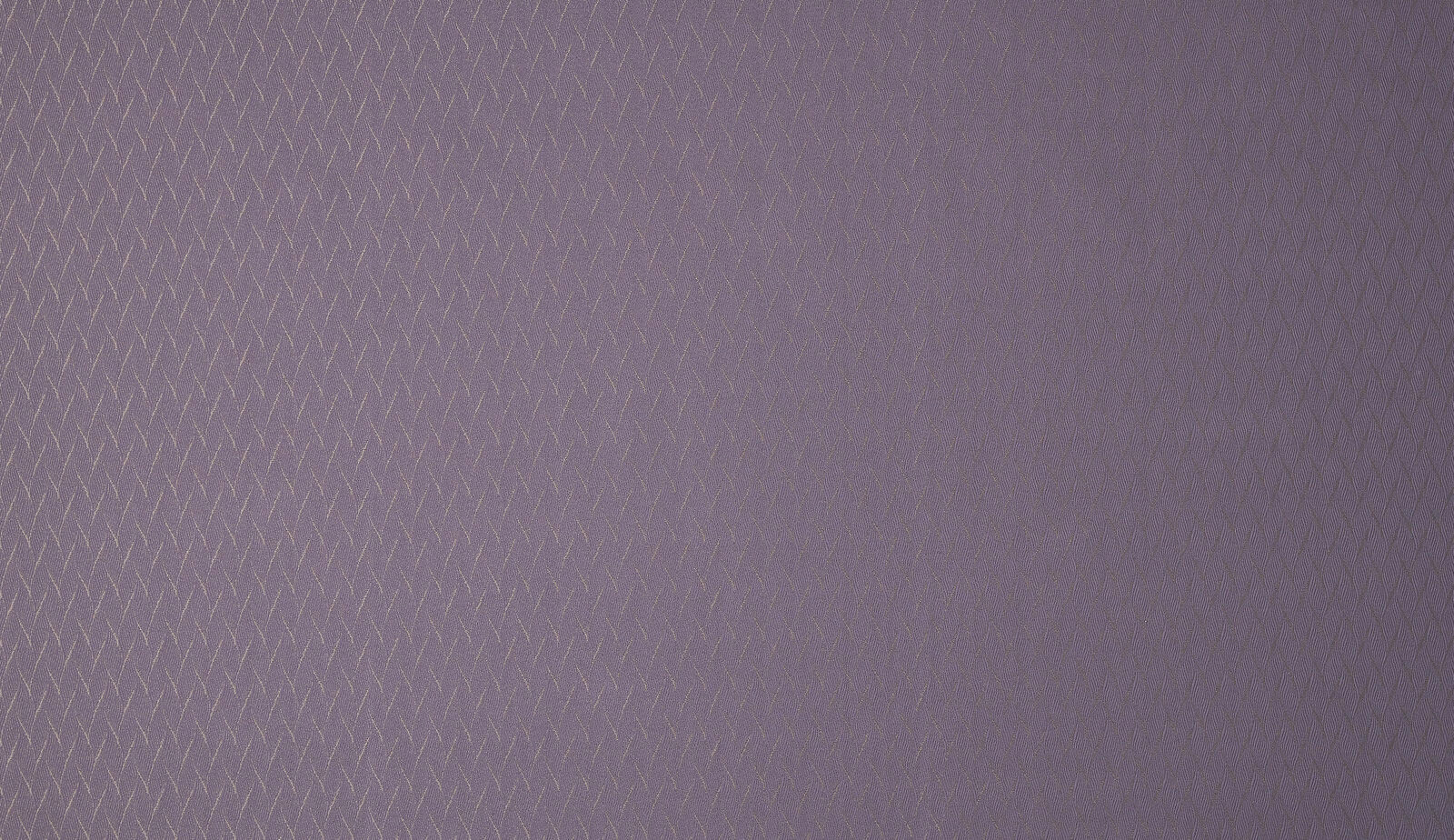 Muted amethyst woven fabric with tiny zigzag texture and soft sheen