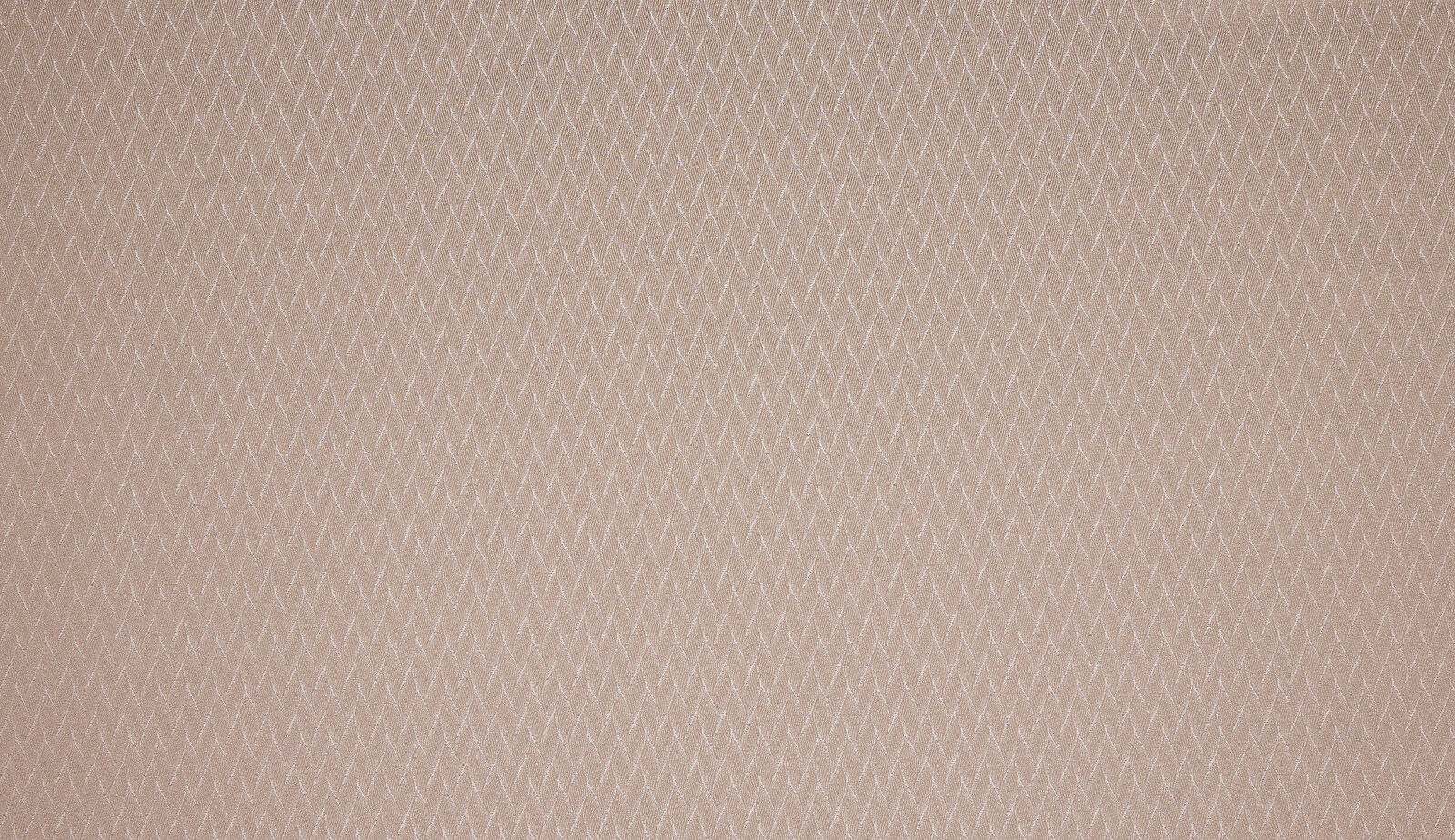 Soft blush pink woven fabric with a fine zigzag texture
