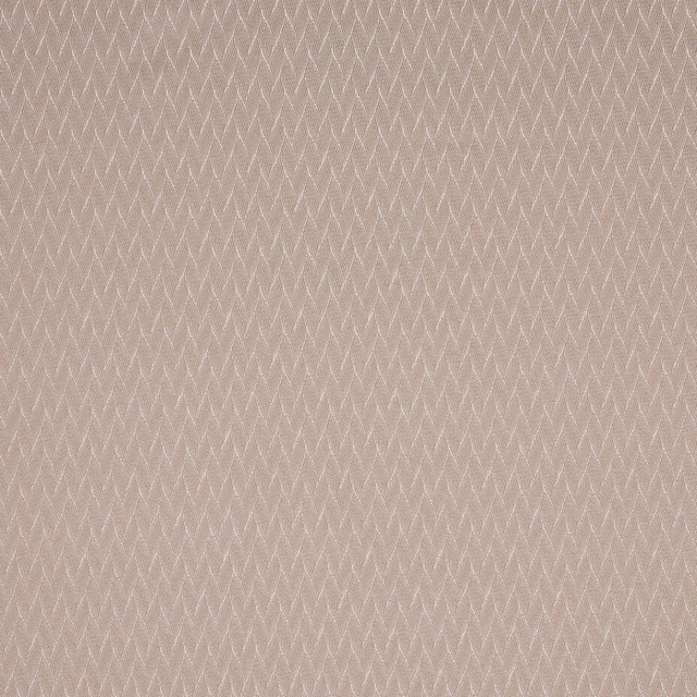 Soft blush pink woven fabric with a fine zigzag texture