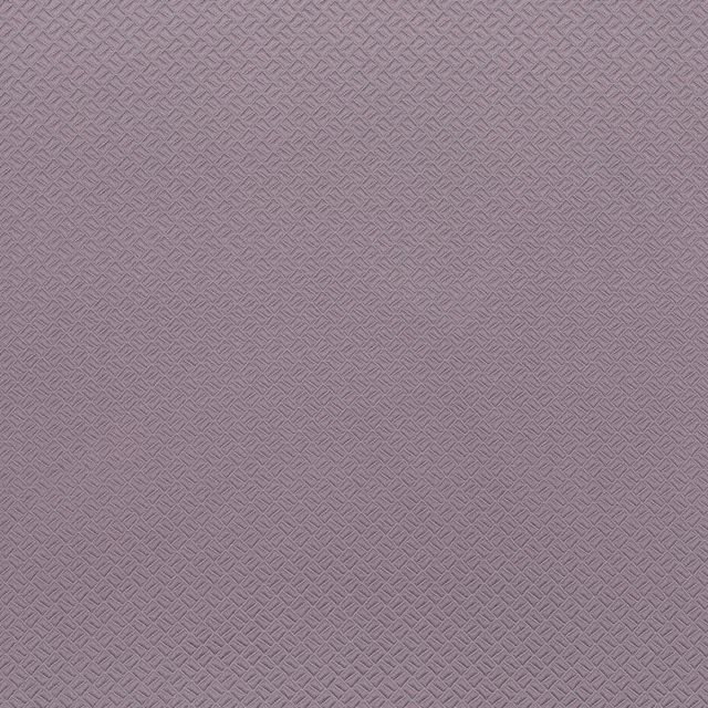 Close-up of soft heathered mauve fabric with small geometric woven texture