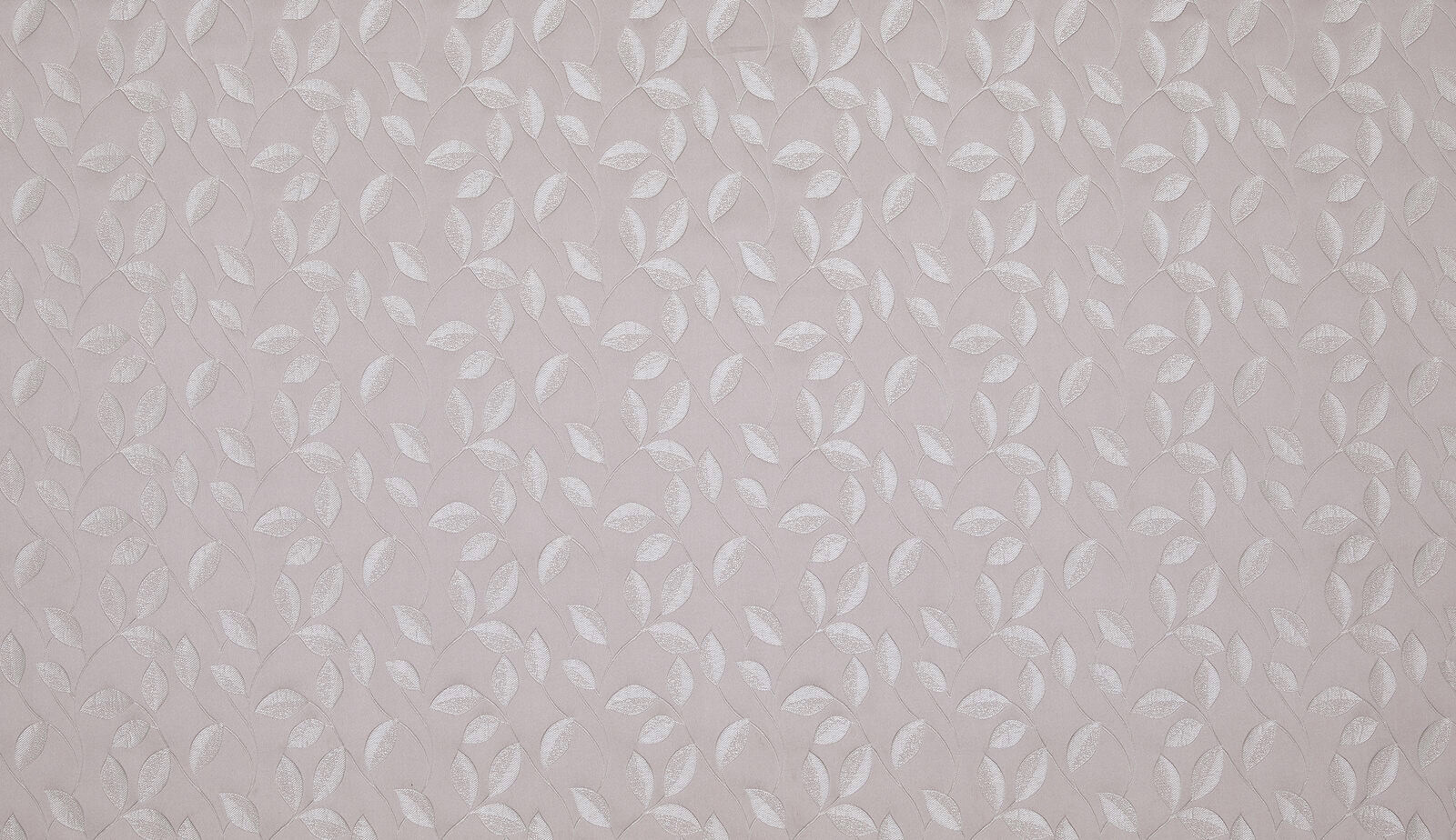 Pale orchid pink woven fabric with small leaf floral motif and soft sheen
