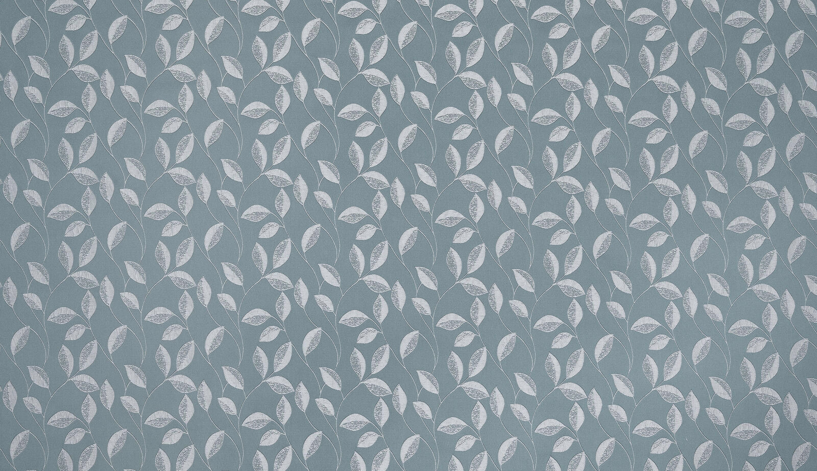 Soft sky-blue fabric with small pale leaf motifs and a fine woven texture