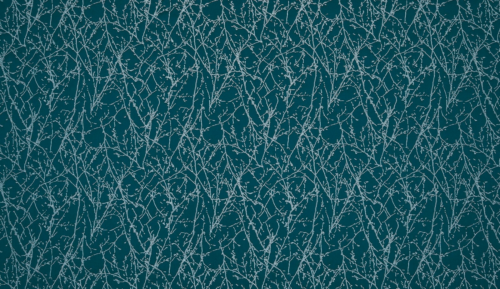 Deep emerald green textured weave with fine pale branching lines