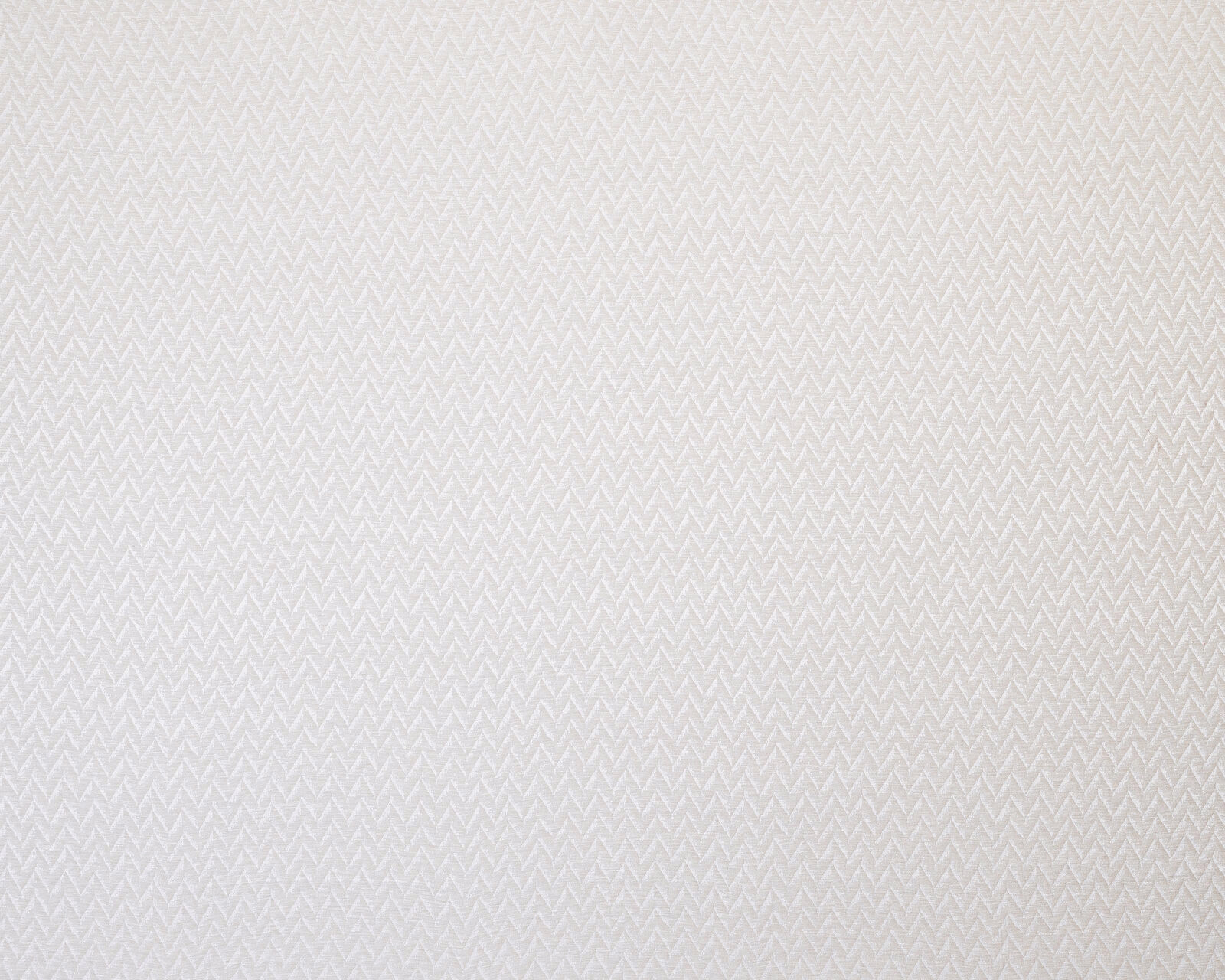 Pale ivory woven fabric with fine geometric herringbone texture