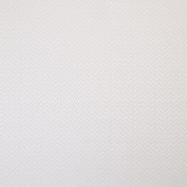 Pale ivory woven fabric with fine geometric herringbone texture
