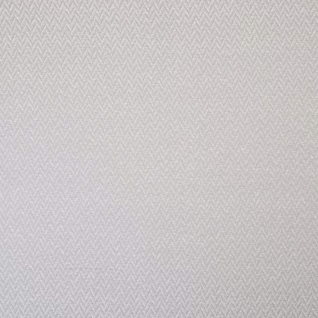 Soft silver-white geometric weave fabric with subtle chevron texture