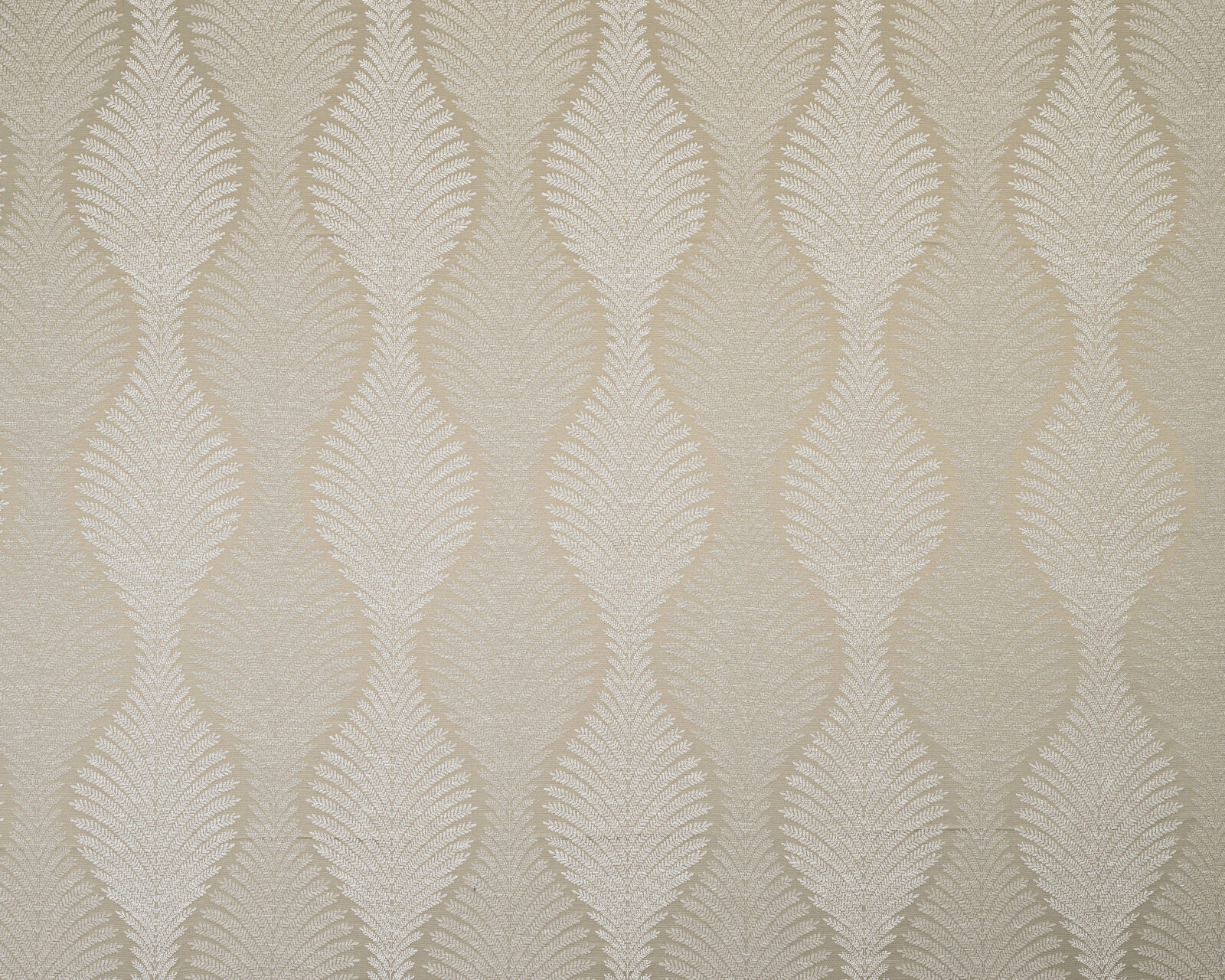 Cream and caramel damask fabric with a repeating leafy oval motif