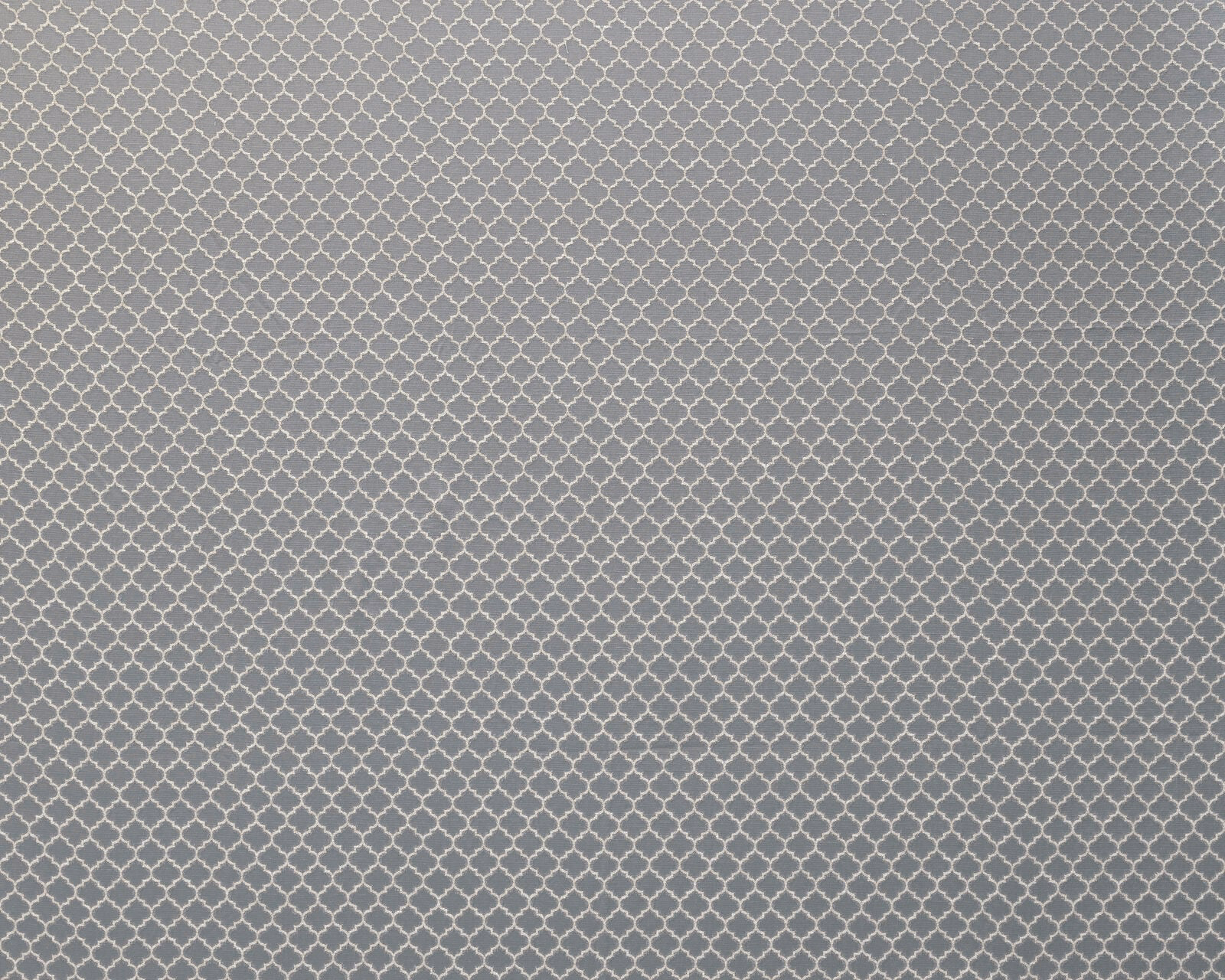 Soft mole-grey woven fabric with a small ivory geometric lattice pattern