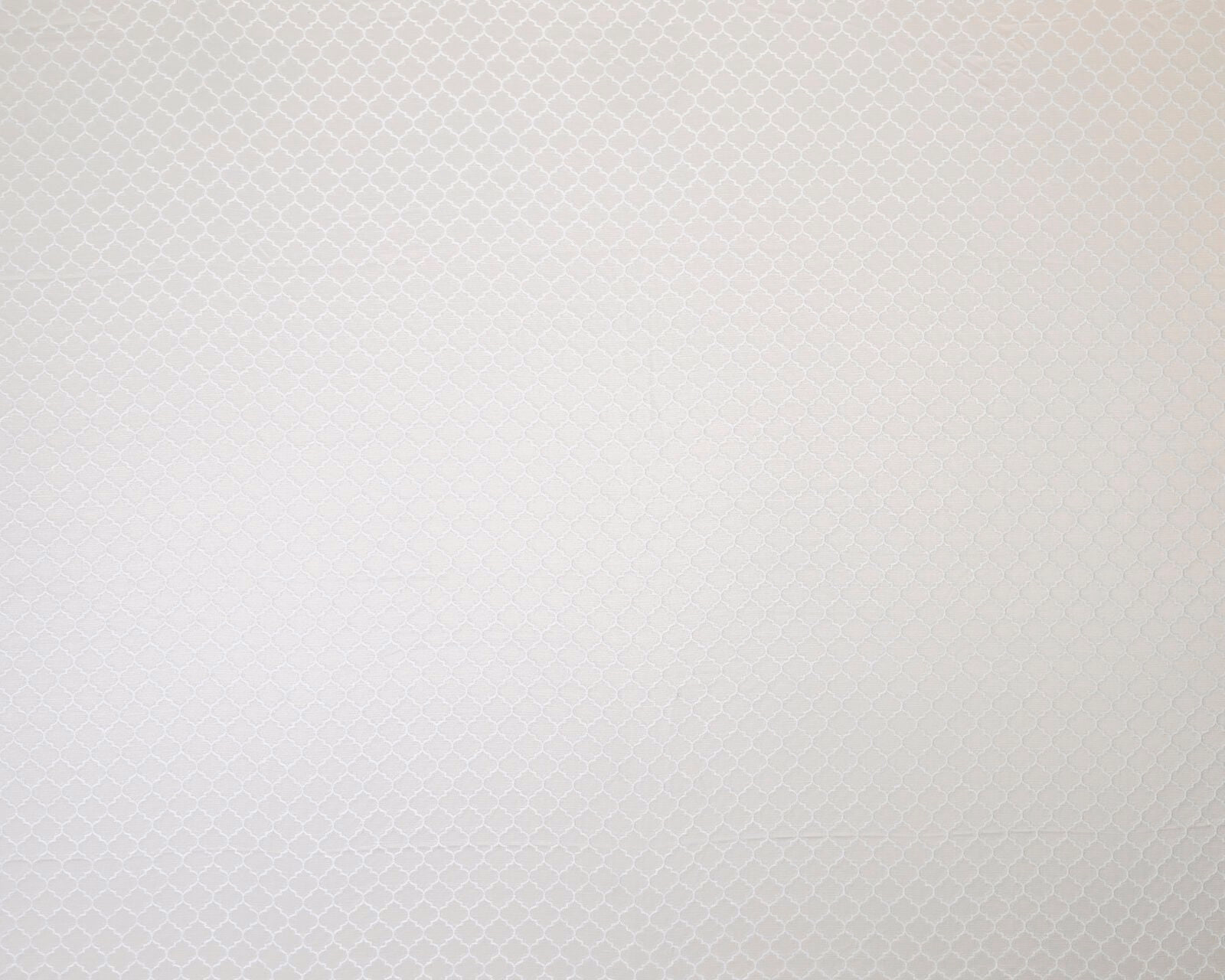 Pale pearl ivory woven fabric with tiny geometric diamond pattern
