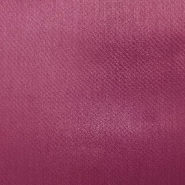 Deep berry-pink plain fabric with a smooth, lightly lustrous surface