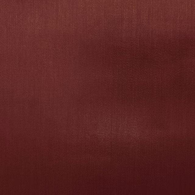 Deep claret red plain fabric with a smooth, subtle sheen