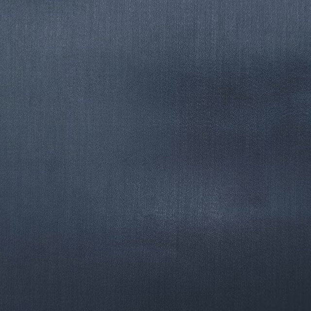 Deep denim-blue plain woven fabric with a smooth matte surface