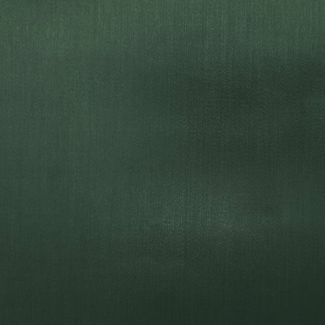 Deep forest green plain fabric with a smooth, softly sheened surface
