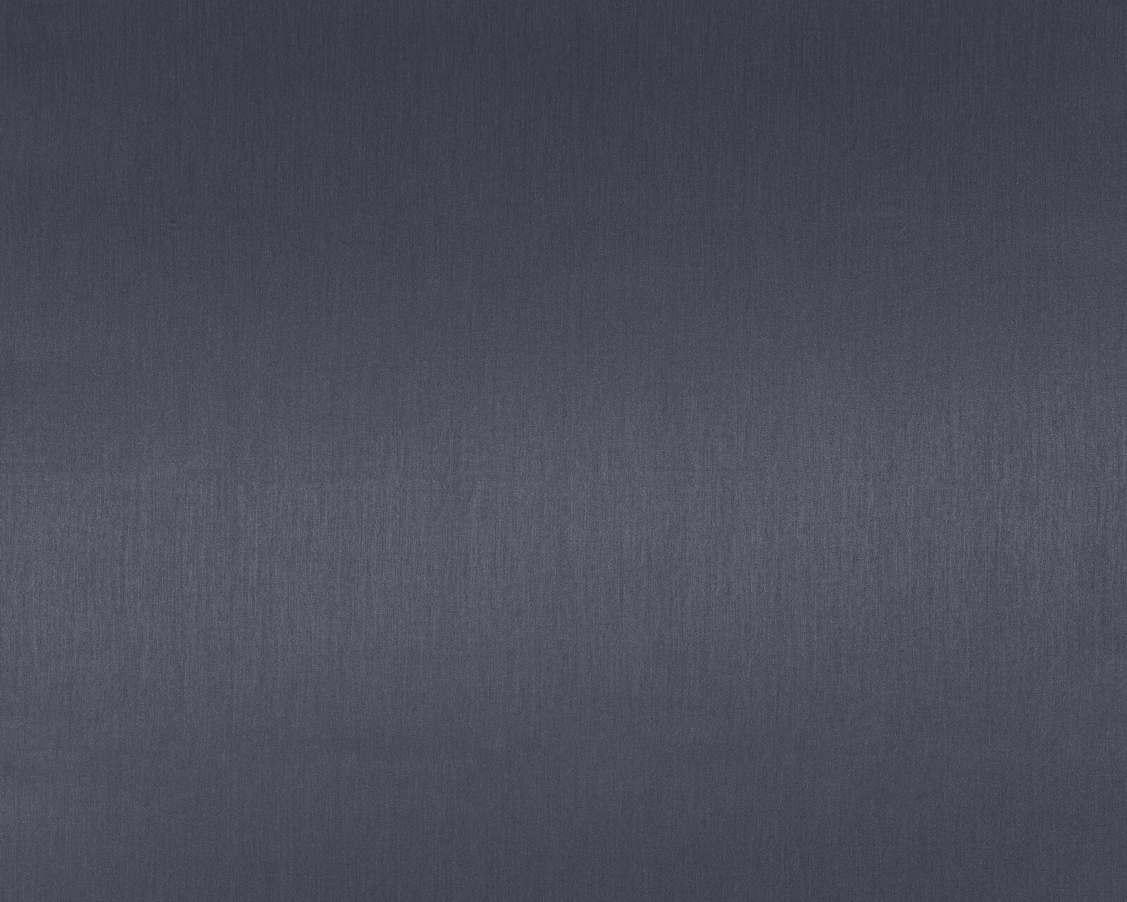 Deep indigo plain fabric with a fine vertical texture and smooth matte finish