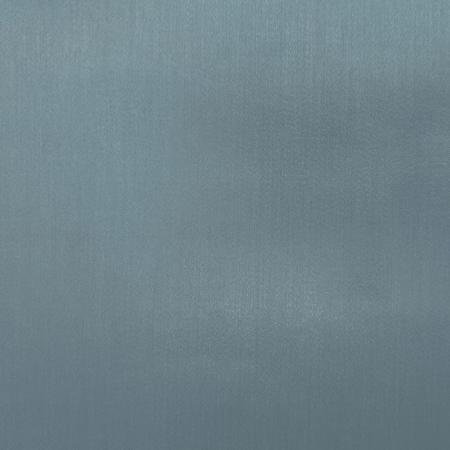 Soft blue-grey plain weave fabric with a smooth, lightly lustrous surface