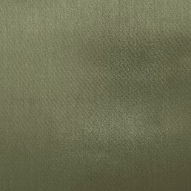 Muted sage green plain fabric with a smooth, subtle sheen