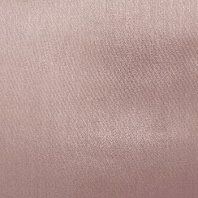 Muted dusty rose plain fabric with a soft satin sheen