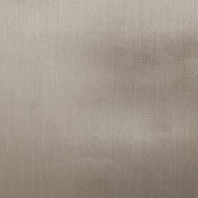 Soft mushroom taupe plain fabric with a smooth matte weave