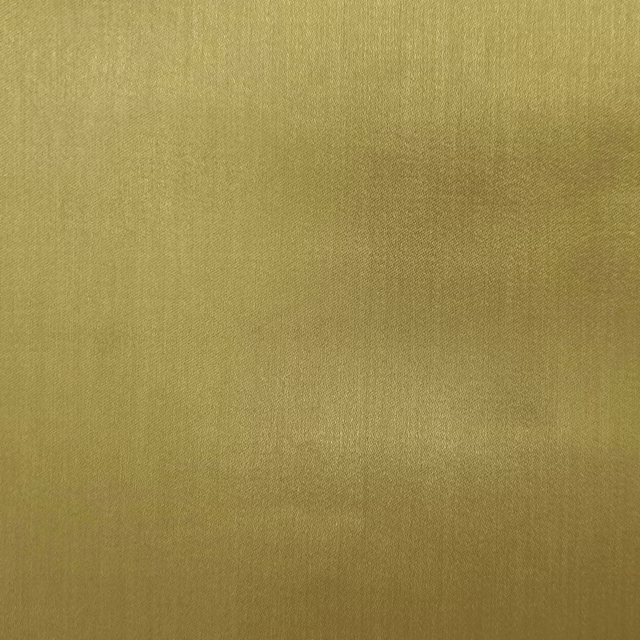 Muted olive-gold plain fabric with a soft, subtle sheen and fine woven texture