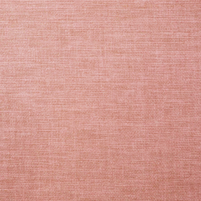 Soft coral pink plain woven fabric swatch with fine horizontal texture