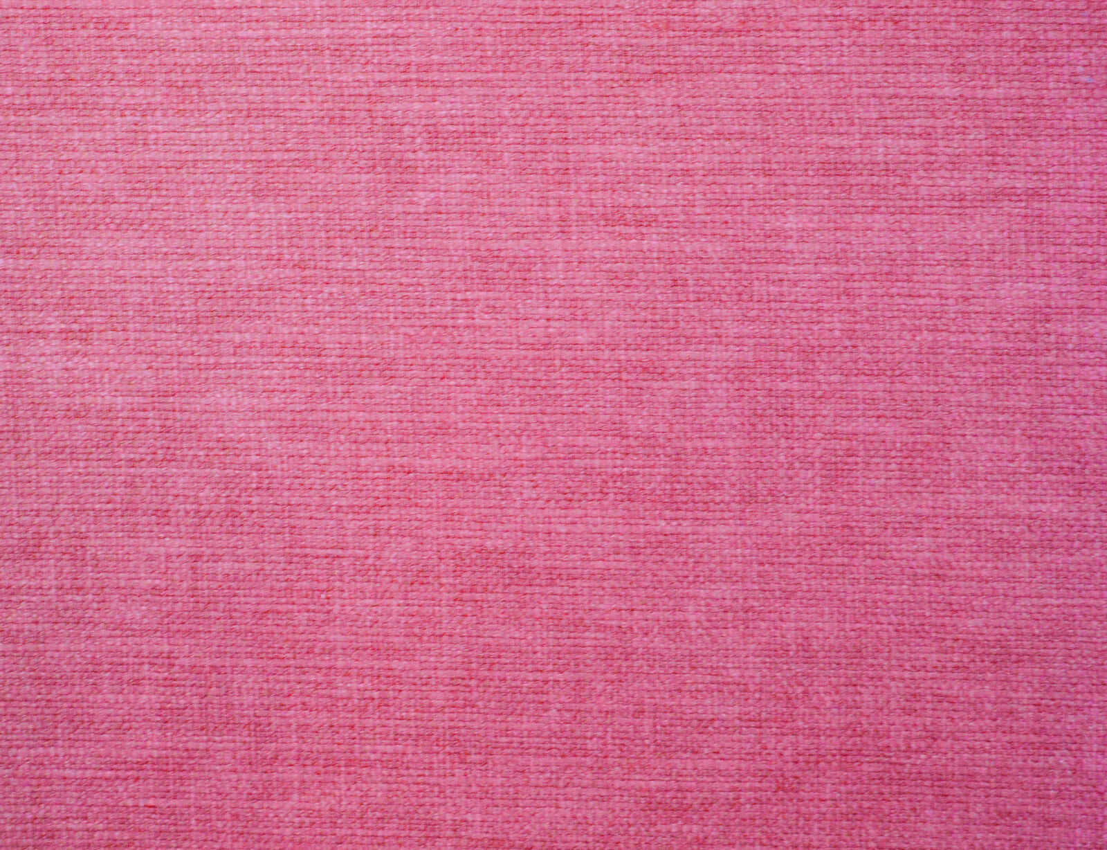 Bright fuchsia pink plain woven fabric with fine slub texture