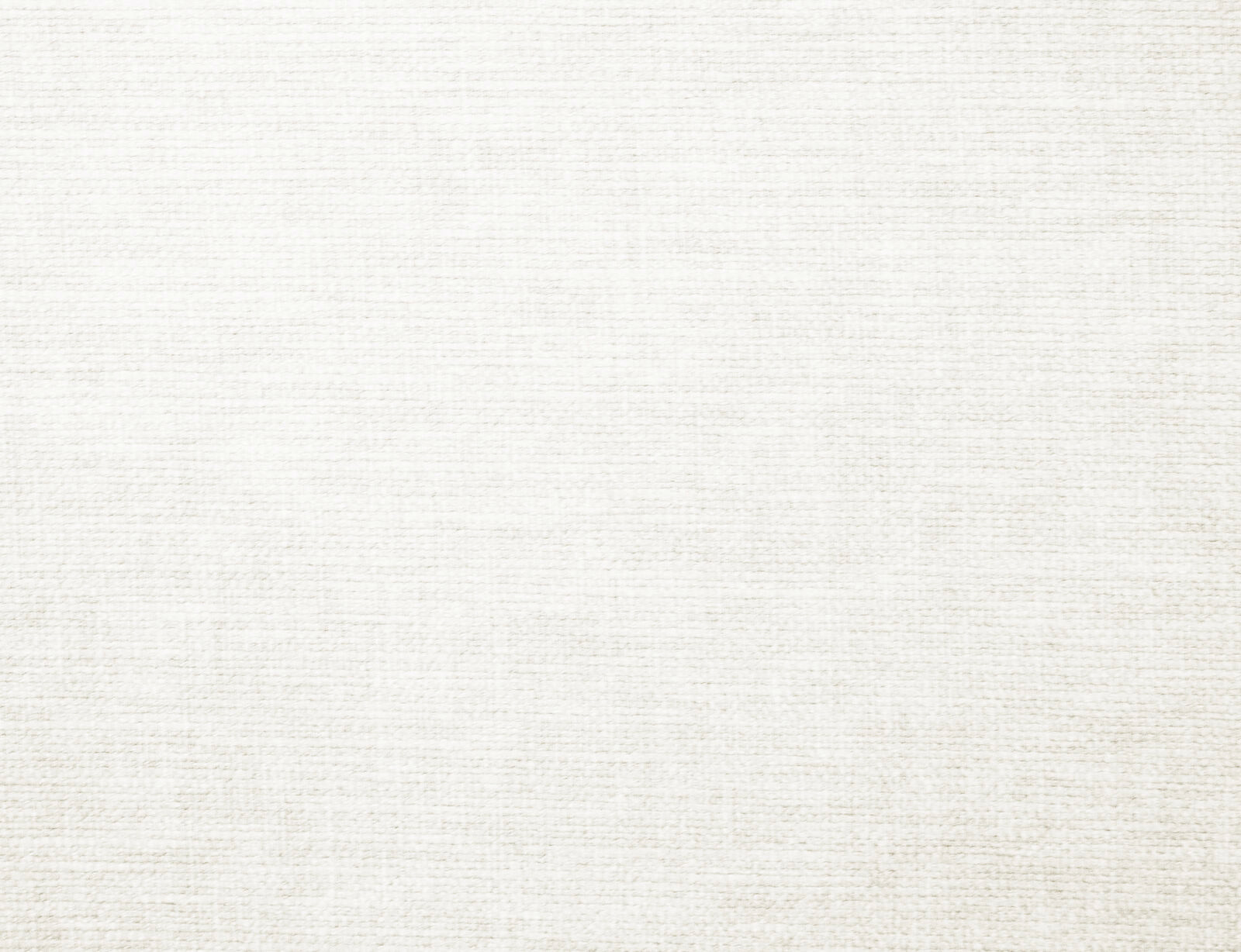 Close-up of a soft ivory plain woven fabric with subtle textured weave