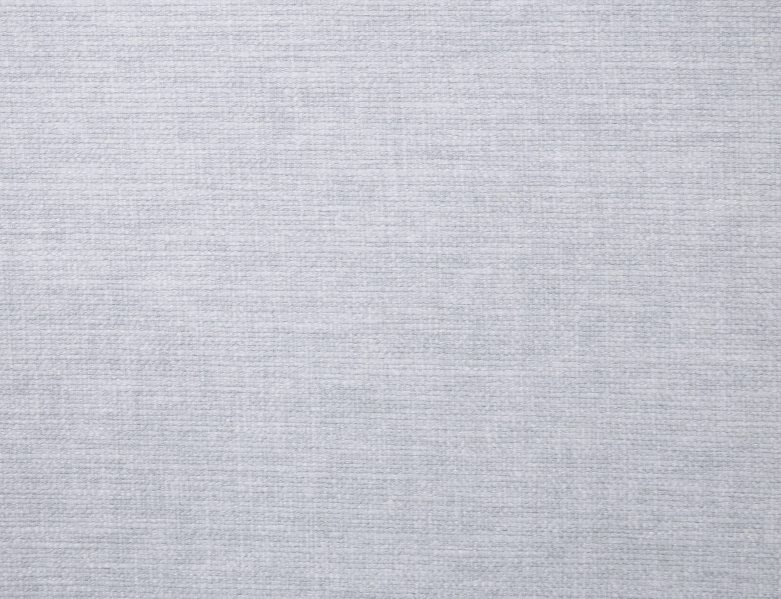 Close-up of pale silver-grey plain woven fabric with a fine textured surface