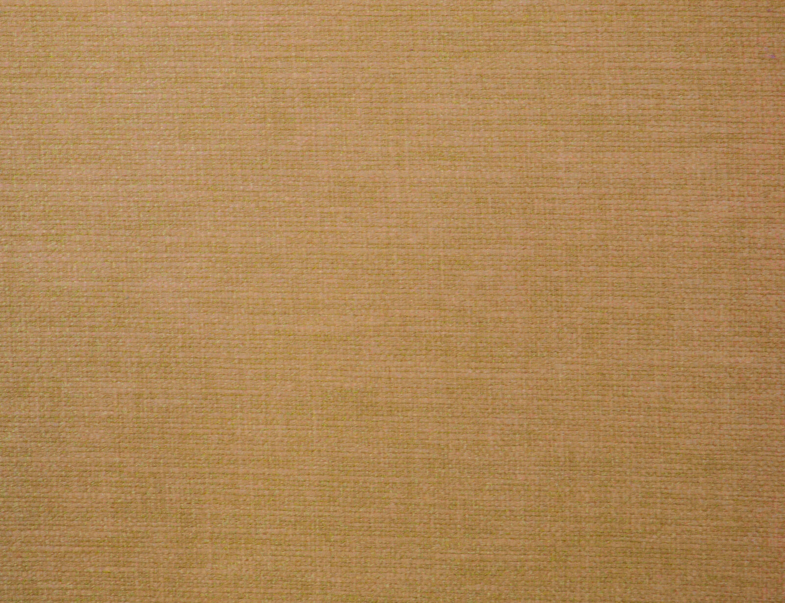 Close-up of muted rust plain woven fabric with fine matte texture