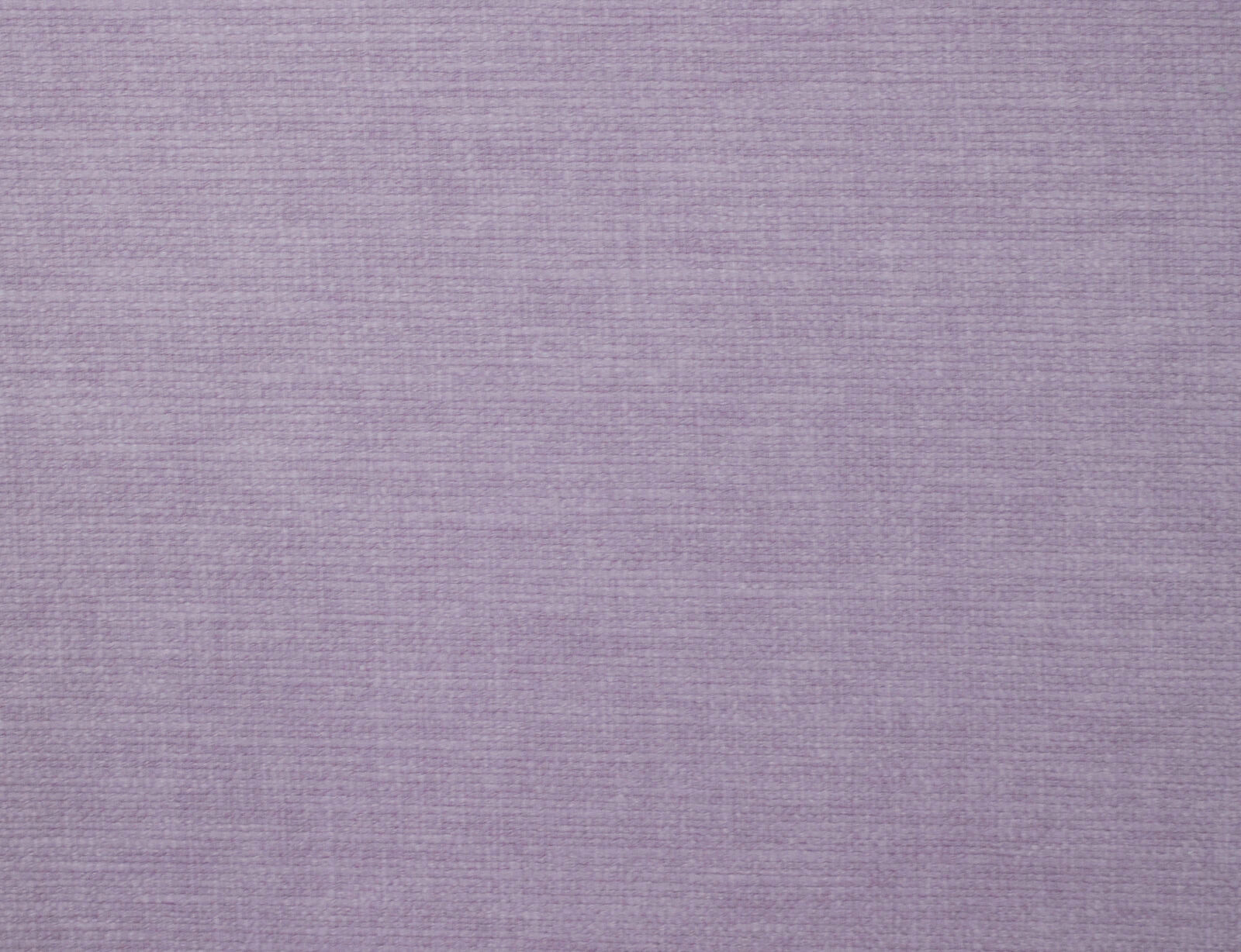 Soft dusty lilac plain woven fabric with a fine textured surface