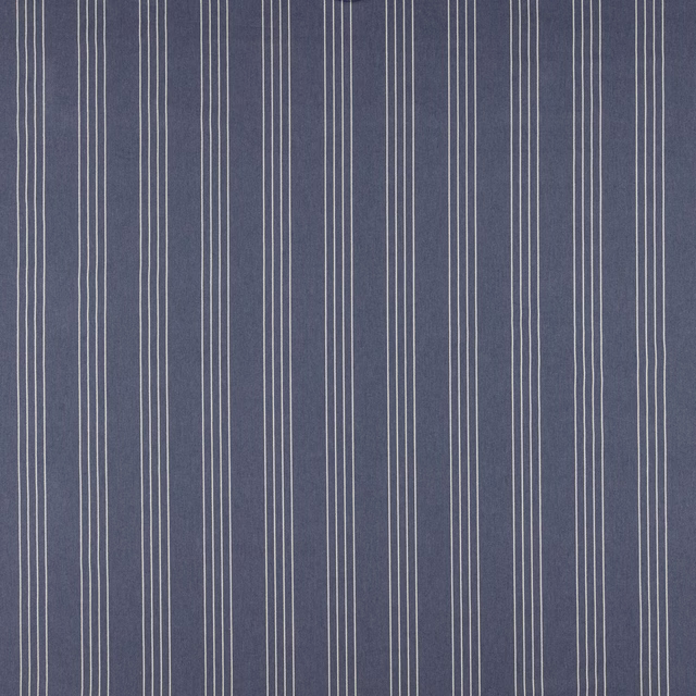 Blue striped fabric with fine pale vertical pinstripes on a muted indigo ground