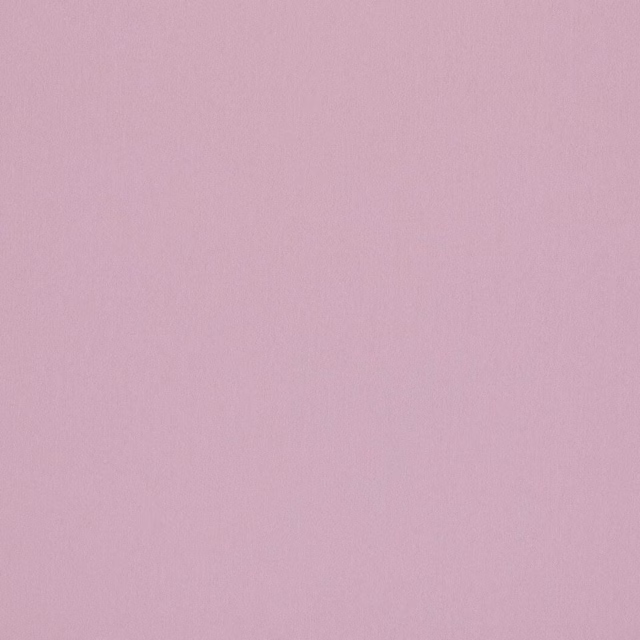 Soft orchid pink plain fabric with a smooth, matte finish