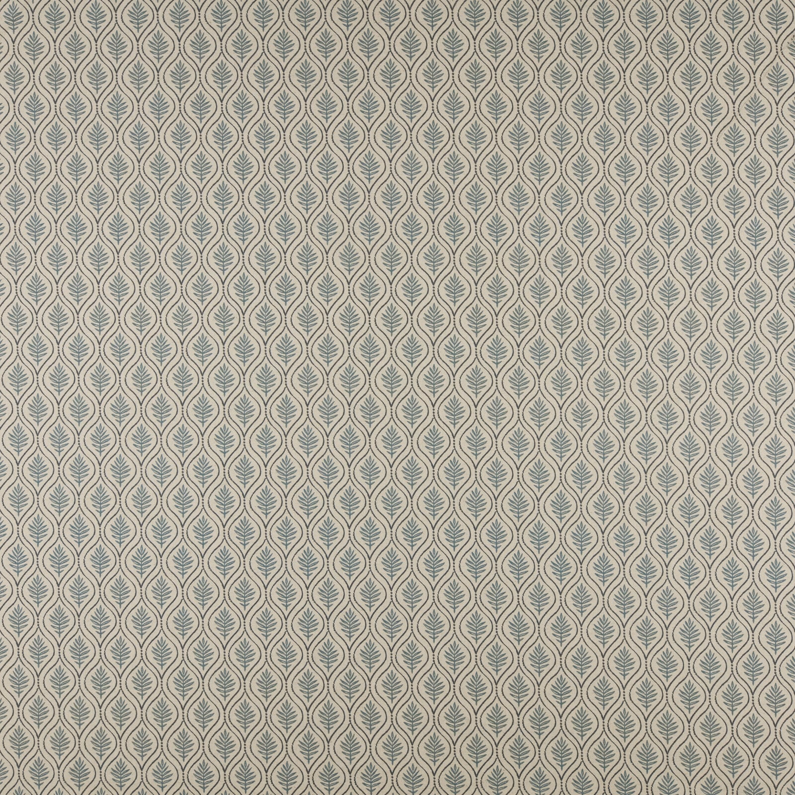 Pale woven fabric with a small indigo leaf-and-oval repeat pattern