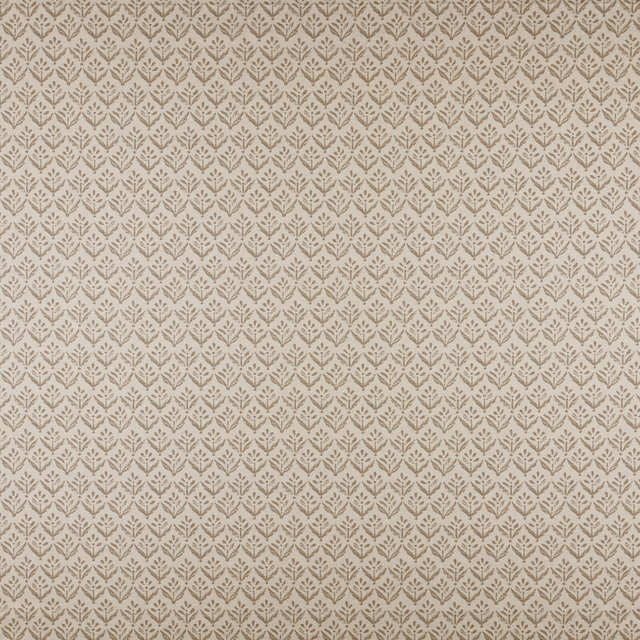 Warm sand-beige fabric with tiny repeated leaf motif and fine woven texture