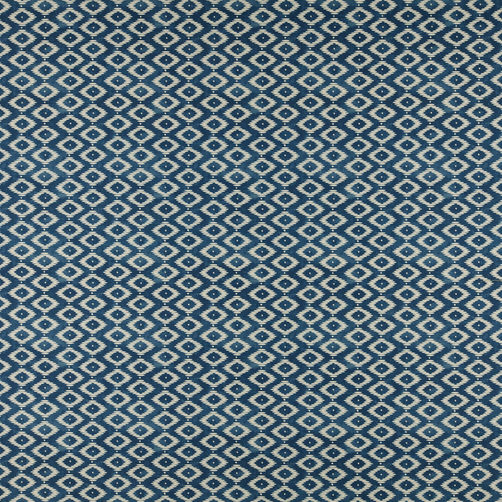 Midnight blue geometric fabric with small ivory diamond motif and woven texture